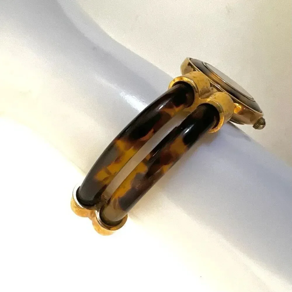 Avon faux tortoise vintage watch/ bracelet.